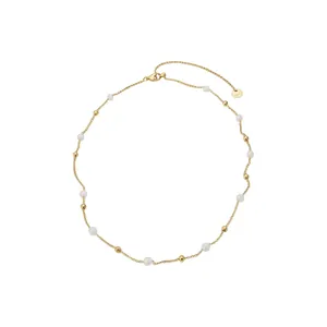 Elegante Perlenhalskette im französischen Stil mit minimalistischen Goldperlen