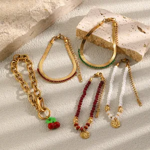 Stylish 18K gold plated stainless steel bracelet set with colorful beads and cherry charm