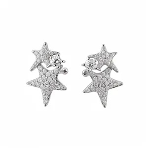 Elegant silver-tone star shaped stud earrings pavé set with sparkling cubic zirconia stones