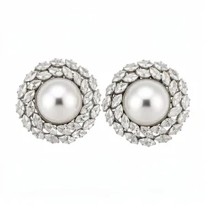 Elegant silver stud earrings with large round pearl and marquise-cut crystal halo