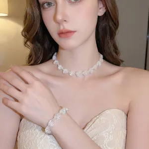 Elegant pearl shell necklace and bracelet jewelry set for women, minimalist aesthetic