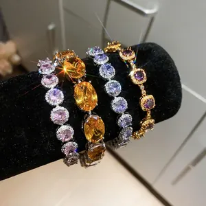 Set of elegant 18k gold plated bracelets with colorful cubic zirconia stones for women