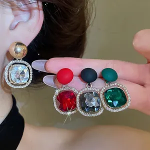 Luxury round geometric stud earrings with rhinestones in red, black, and green colors