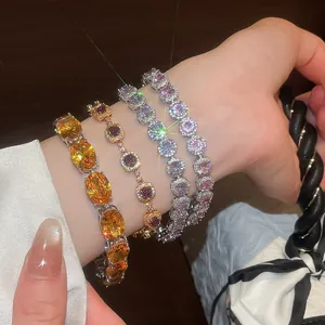 Close-up of sparkling 18k gold plated cubic zirconia bracelets in various colors