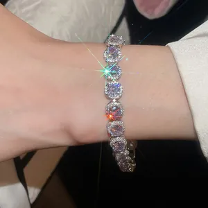 Detailed macro view of an elegant 18k gold plated zircon bracelet featuring purple stones