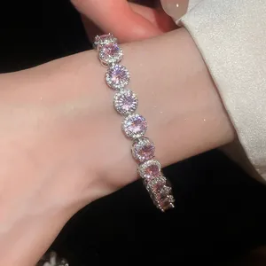 Elegant 18k silver-plated bracelet featuring round pink cubic zirconia gems on the wrist