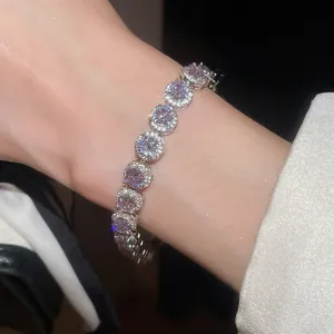 Close-up of sparkling zircon bracelet worn on wrist showing fine jewelry details