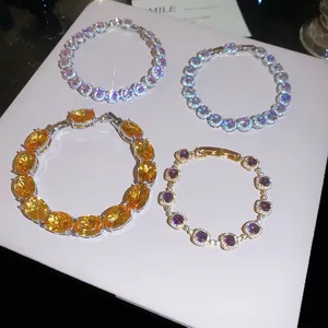 Detailed view of 18k gold plated zircon bracelets with sparkling colorful stones