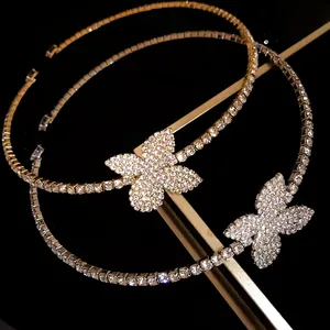 Detailed macro view of a luxury gold-tone choker necklace encrusted with brilliant rhinestones