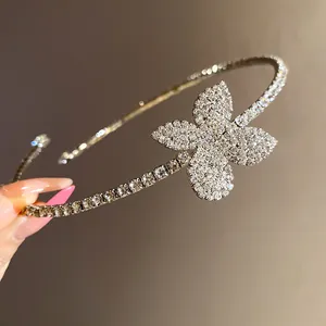 Detailed macro view of a sparkling rhinestone flower pendant on an elegant silver choker