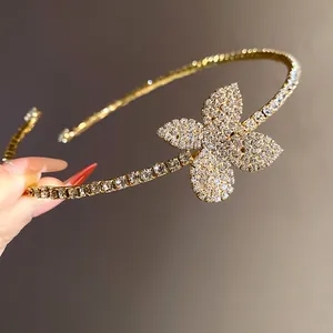 Detail view of sparkling rhinestone flower choker necklace with elegant gold finish