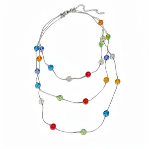 Elegant triple layer necklace with colorful faceted glass beads on silver chains
