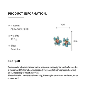 Detailed view of elegant blue flower stud earrings showing 3cm size and alloy material