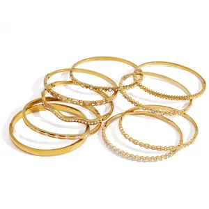 Luxury gold-plated stainless steel bangle set with rhinestones and secure clasp closure