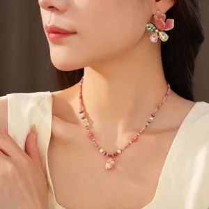 Elegant pink ceramic beaded necklace with cute dog pendant and floral earrings jewelry set