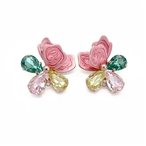 Elegant butterfly stud earrings with pink enamel and multicolored pear-cut crystals.