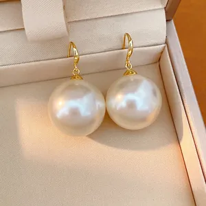 Elegant 18k gold plated large white round pearl hook earrings presented in a luxury box