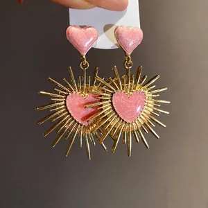 Boucles d'oreilles pendantes vintage en forme de cœur avec design étoilé