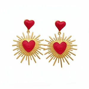 Boucles d'oreilles vintage dorées avec cœurs émail rouge et design de rayons de soleil