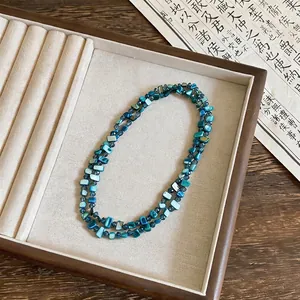 Blue square shell beaded necklace with layered design for a fresh vacation look
