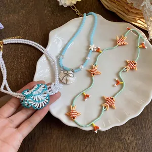 Handmade beaded fish and shell necklaces for summer vacation style ocean jewelry