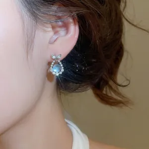 Elegant sea blue zircon fish tail stud earrings with sparkling crystal accents for women
