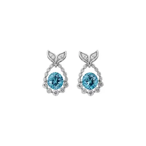 Elegant fish tail stud earrings with a round aquamarine zircon in a silver-toned finish