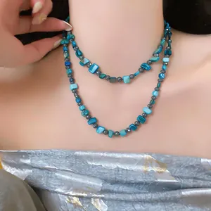Close-up of blue square shell beaded double-layered necklace for a stylish beach vacation