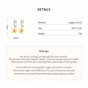 Detail of star earrings showing zircon embellishments and size measurement specifications.