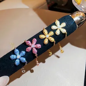 Anello Regolabile a Catena con Fiore in Zirconia Colorata per Donna Monet Garden Rame Placcato Oro Design di Nicchia Gioielli di Moda Regalo