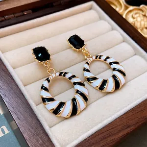 Vintage style black and white striped hoop drop earrings with black square crystal studs