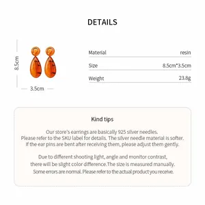Detail of orange resin teardrop earrings with 925 silver needles and dimensions