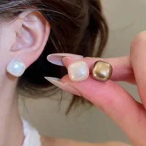 Minimalist geometric square pearl stud earrings set with elegant iridescent finish