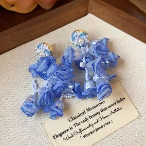 Elegant blue chiffon flower and pearl stud earrings for a sweet beach vacation style