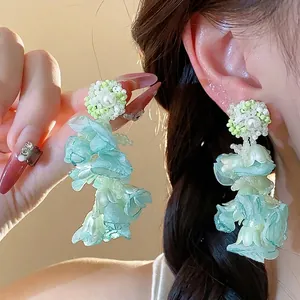 Elegant mint green chiffon flower and pearl stud earrings for beach vacation style