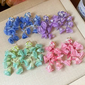 Handmade chiffon flower and pearl drop earrings in pastel blue, purple, mint, and pink.