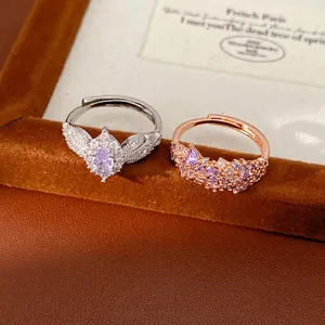 Exquisite palace style zircon inlaid oval rings in silver and rose gold finishes