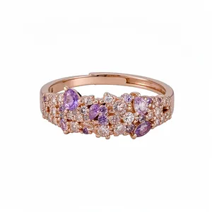 Elegant rose gold adjustable ring clustered with purple and clear cubic zirconia stones