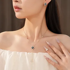 Elegant gold plated zircon rhombus star necklace and matching stud earrings set for women