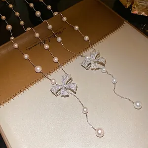 French vintage zircon bow necklace with pearl beads and dangling charms for women
