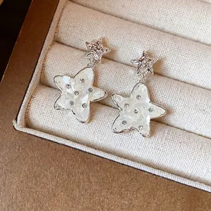 Elegant star drop earrings with mother of pearl and silver needles for women jewelry.