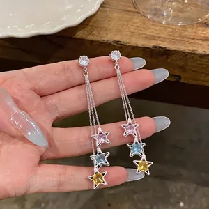 Elegant long tassel earrings featuring colorful star-shaped zircon charms on a silver stud base