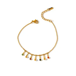 Close-up of elegant gold-plated stainless steel bracelet featuring vibrant zircon charms