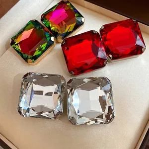 Elegant square cut rhinestone stud earrings with silver needles in luxury jewelry box