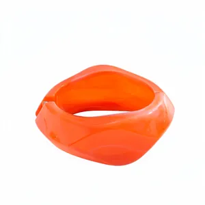 Vibrant orange irregular geometric resin hinged bangle bracelet in dopamine style