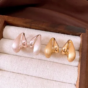 Luxury 18k gold plated silver needle brushed waterdrop earrings in a jewelry box