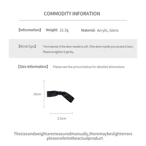 Detailed material and size specifications for the polka dot fabric bow hair clip