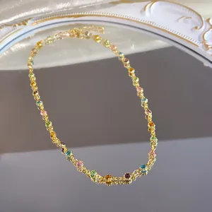 Close-up showing the vibrant multi-color resin beads of the dainty gold necklace