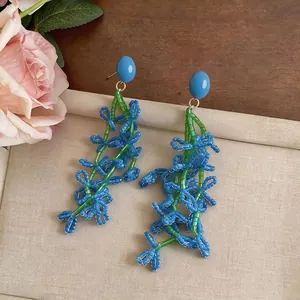 Handmade blue and green beaded tassel earrings for elegant summer vacation style