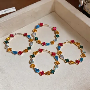 Elegant colorful zircon hoop earrings with vibrant square and teardrop multi-color stones.